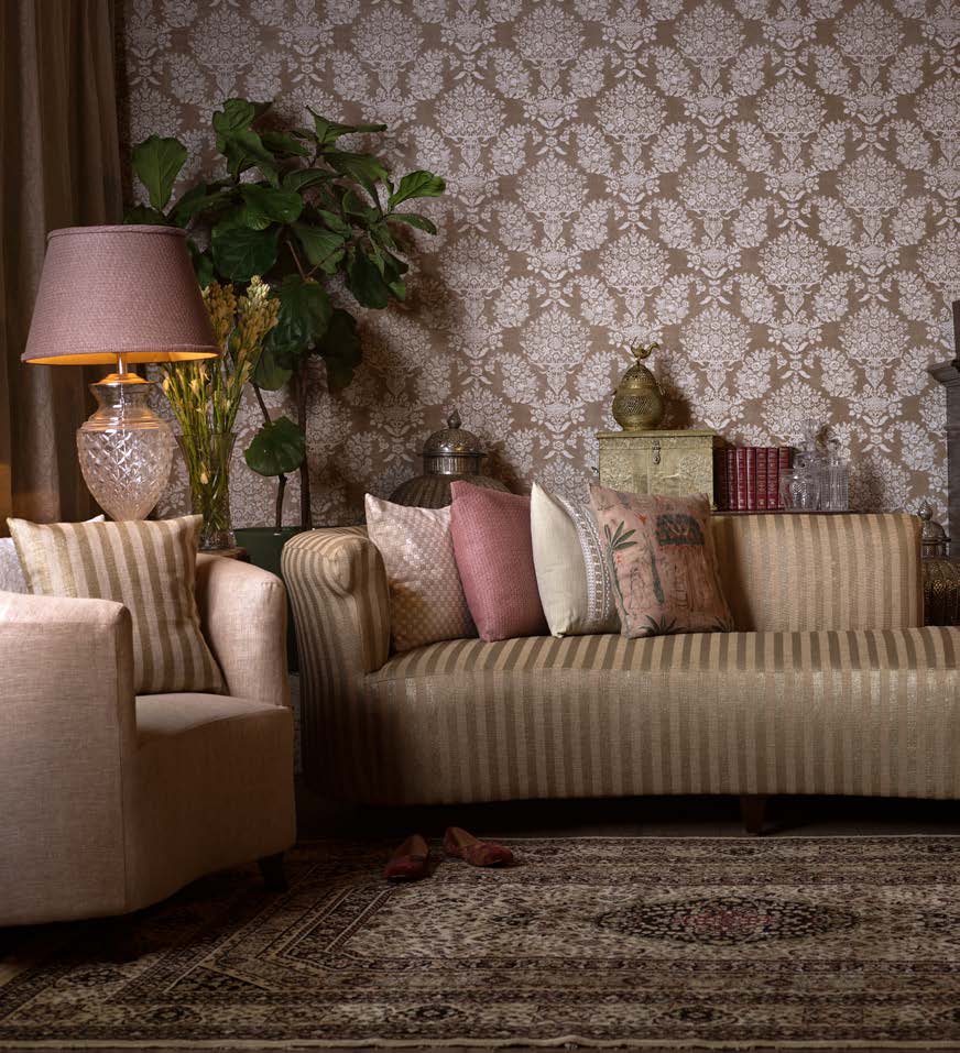 Sabyasachi Vatika wallpaper in Geeli Mitti styled in a living room, VRSA