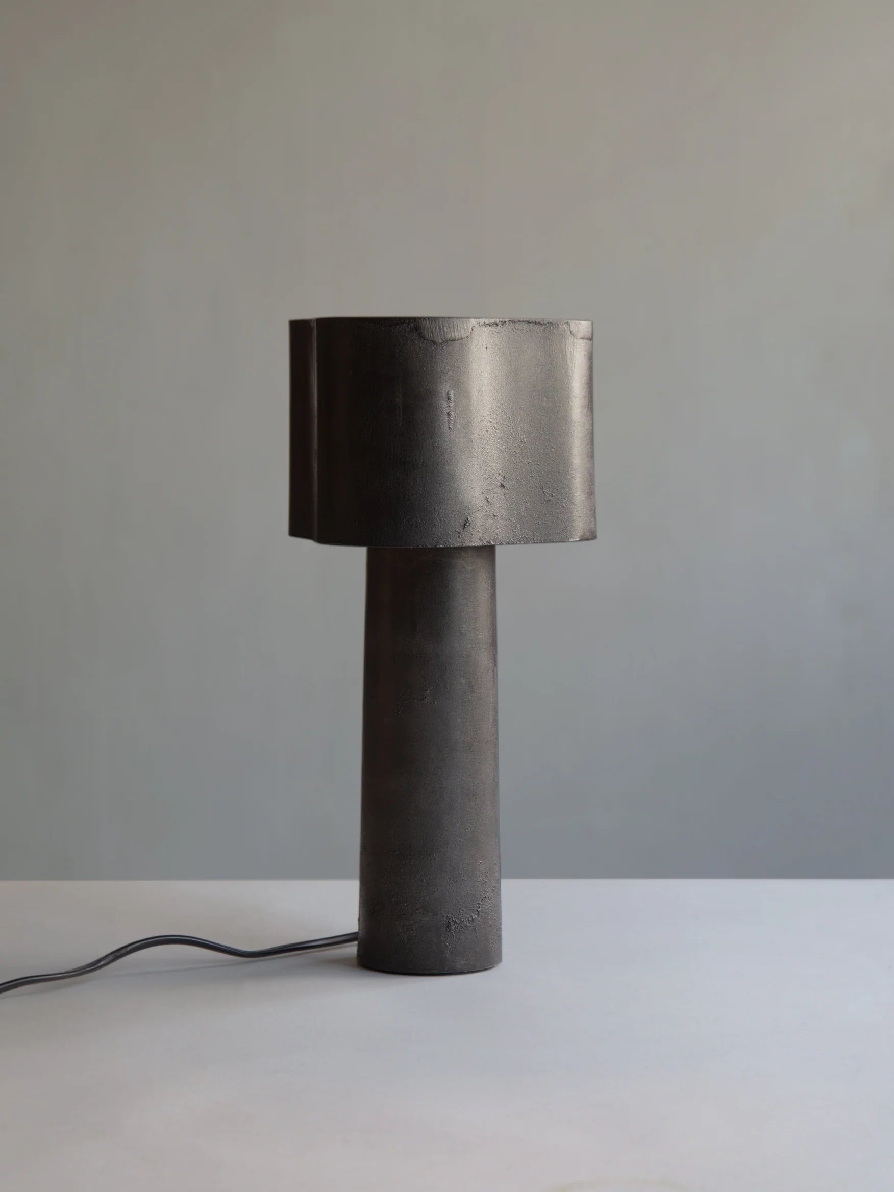 Coy Table Lamp in Black Patina